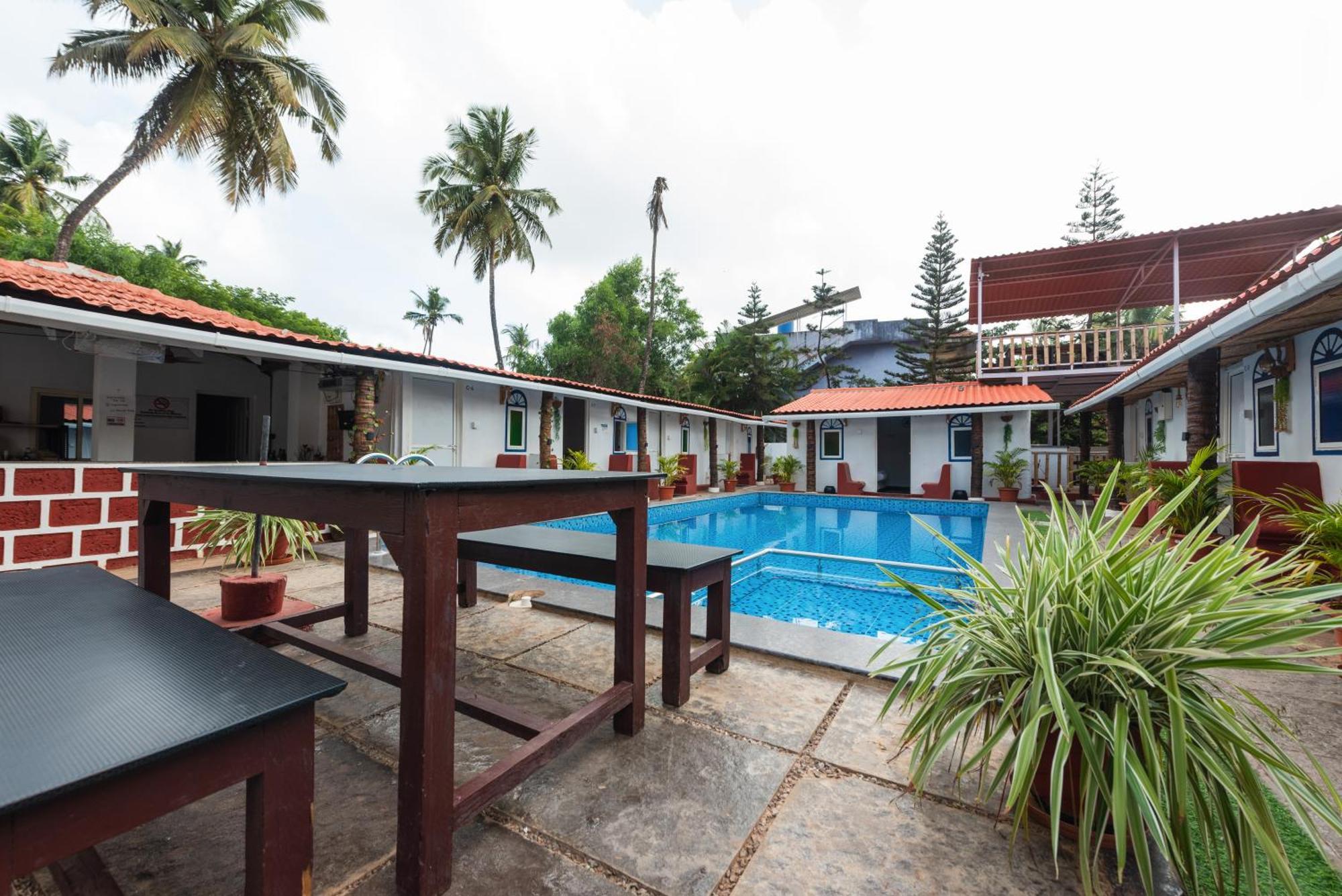 Hotel La Paulo'S Near Beach Resort Morjim Exterior foto