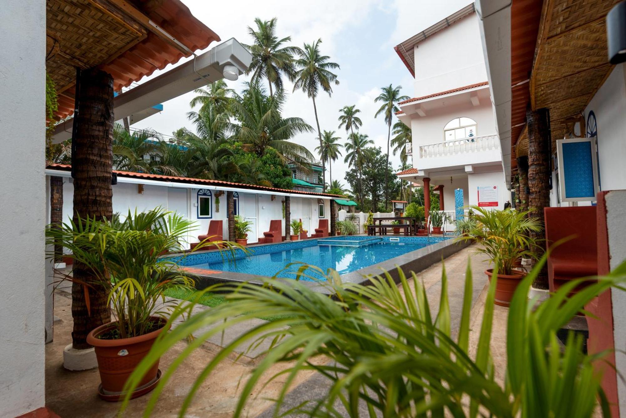 Hotel La Paulo'S Near Beach Resort Morjim Exterior foto