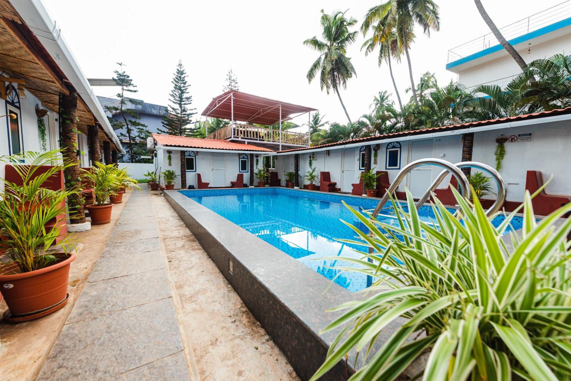 Hotel La Paulo'S Near Beach Resort Morjim Exterior foto